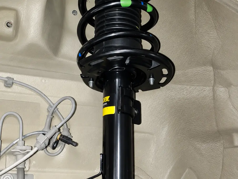 New front shock absorber and coil spring fitted